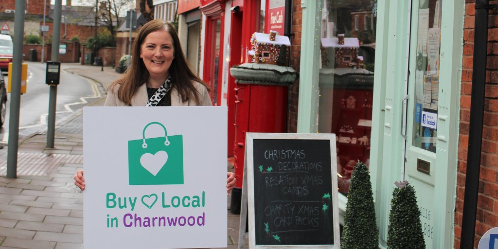 Cllr Shona Rattray, lead member for business support, with the Buy Local in Charnwood logo on a local high street