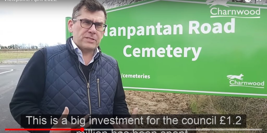 The image shows a screengrab of the video with Cllr Morgan at the new cemetery in Louughborough