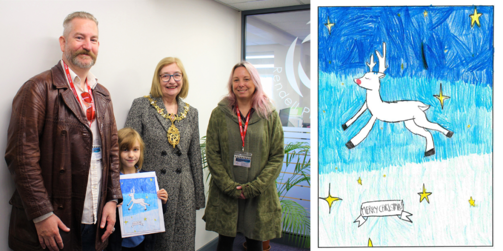 The Mayor of Charnwood, Cllr Jennifer Tillotson, with 10-year-old Daisy Morris, the winner of the Mayor's Christmas card competition, and her parents.