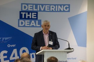 Prof Chris Rielly speaks to guests at the Delivering the Deal event