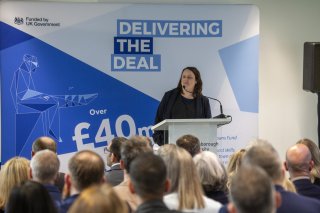 Dr Chrissie Van Mierlo, from the Loughborough Bellfoundry Trust, speaks to guests at the Delivering the Deal event
