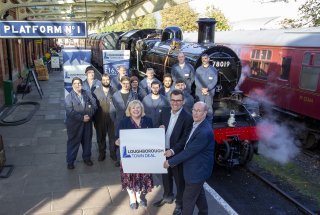 At the front, from left, Jane Hunt, MP for Loughborough, Cllr Jonathan Morgan, co-chair of Loughborough Town Deal and Leader of Charnwood Borough Council, and David Ellard, commercial manager for Great Central Railway with staff and engineers from Great Central Railway