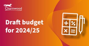 The image shows a calculator and the words draft budget for 2024-25