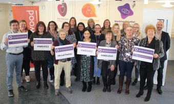 The picture shows Councillors and staff plus representatives from partner organisations who got together to mark International Women's Day on March 8 2022